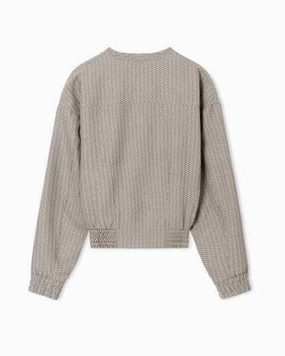 V-neck blouson in 3D effect micro-pattern fabric