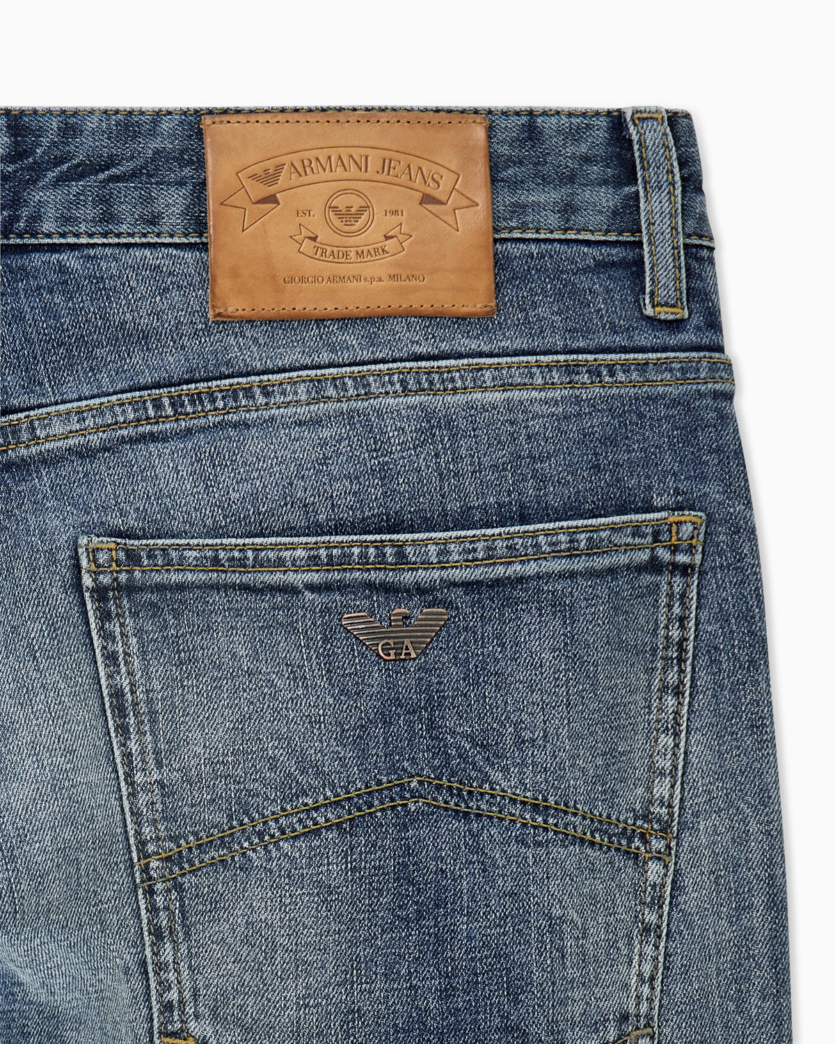 Straight-leg denim jeans with faded wash and whiskering