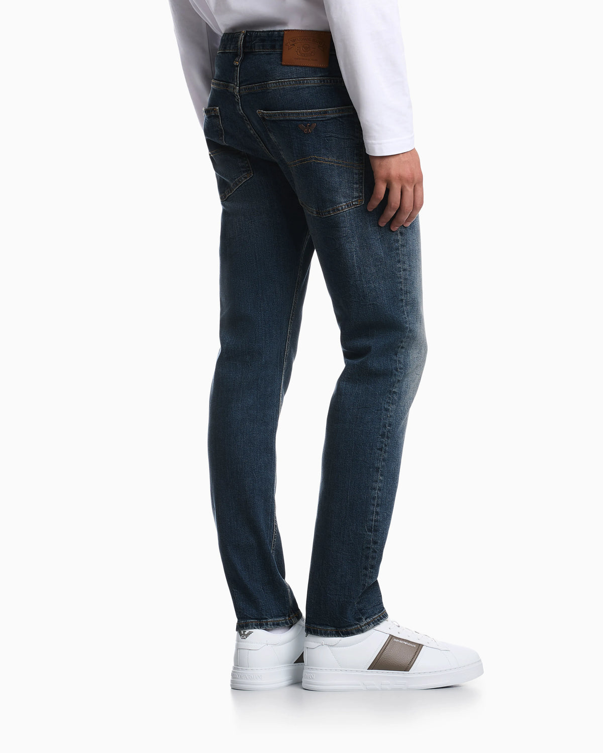 Straight-leg denim jeans with faded wash and whiskering