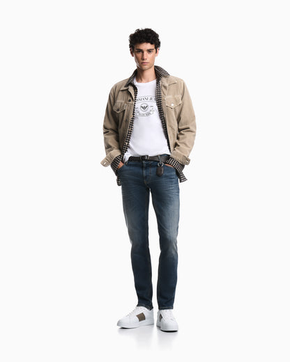Straight-leg denim jeans with faded wash and whiskering