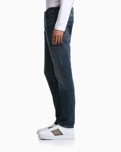 Straight-leg denim jeans with faded wash and whiskering