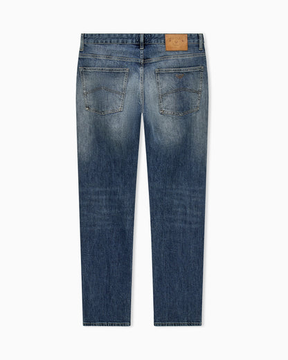 Straight-leg denim jeans with faded wash and whiskering