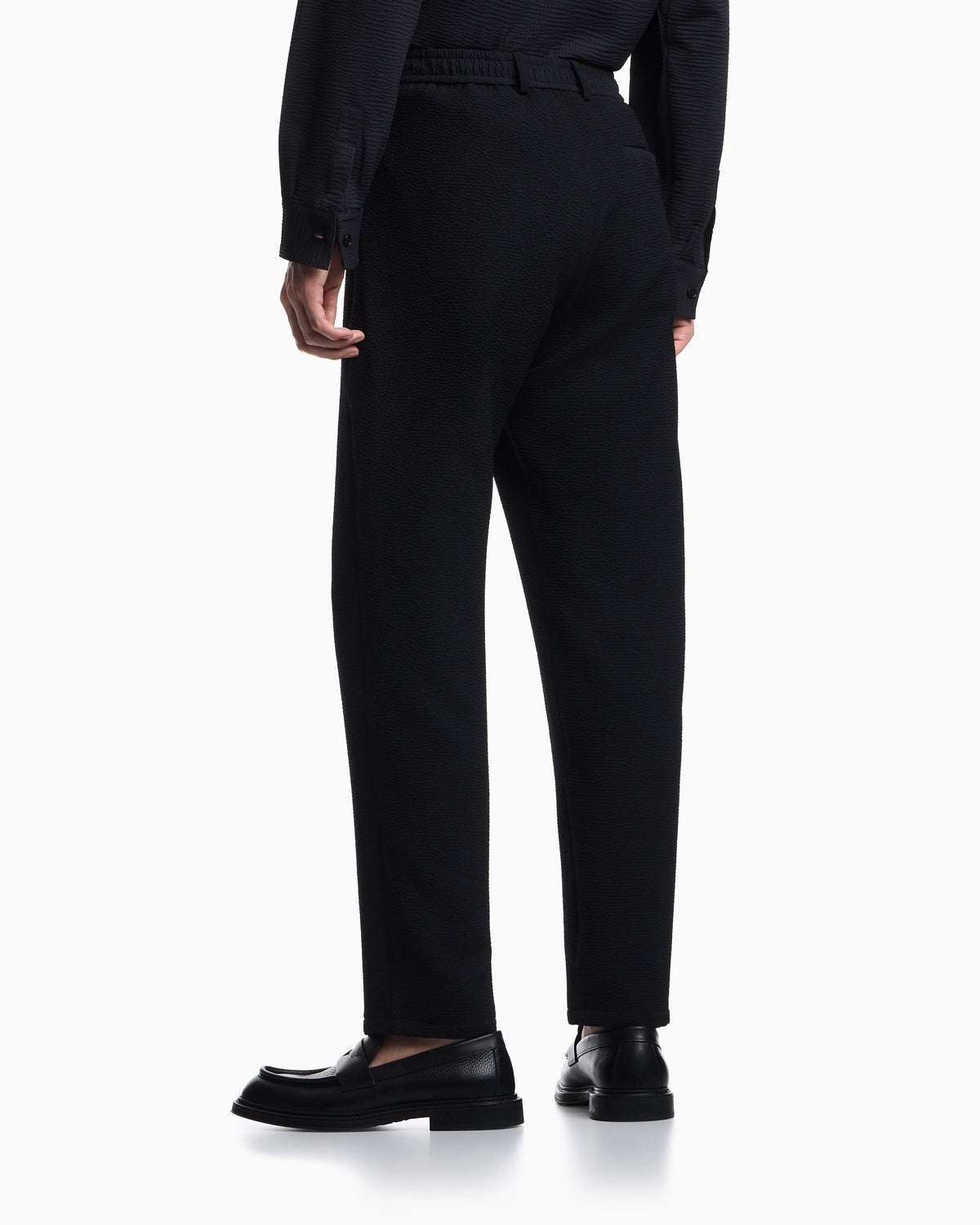 Icon embossed pattern-fabric trousers