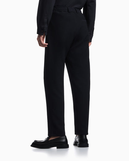Icon embossed pattern-fabric trousers