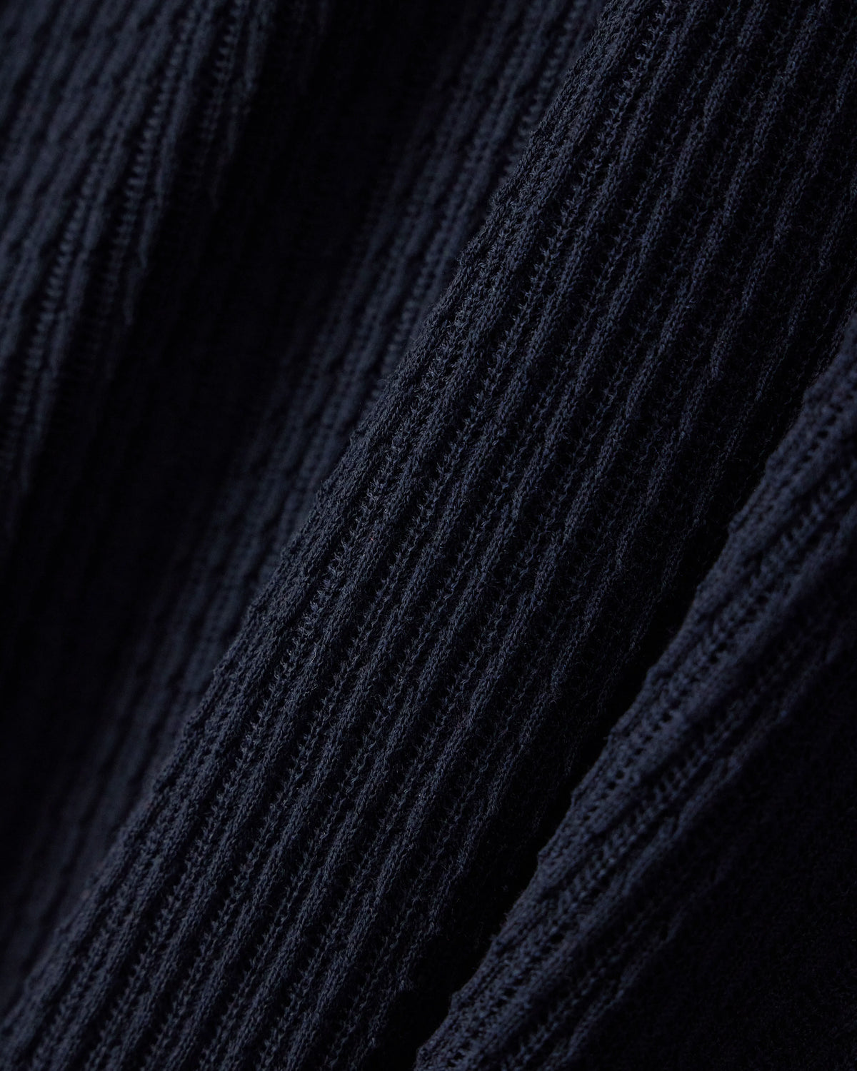 Polo collar sweater in wool and lyocell blend with patterned knit