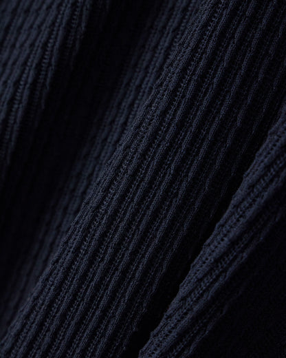 Polo collar sweater in wool and lyocell blend with patterned knit