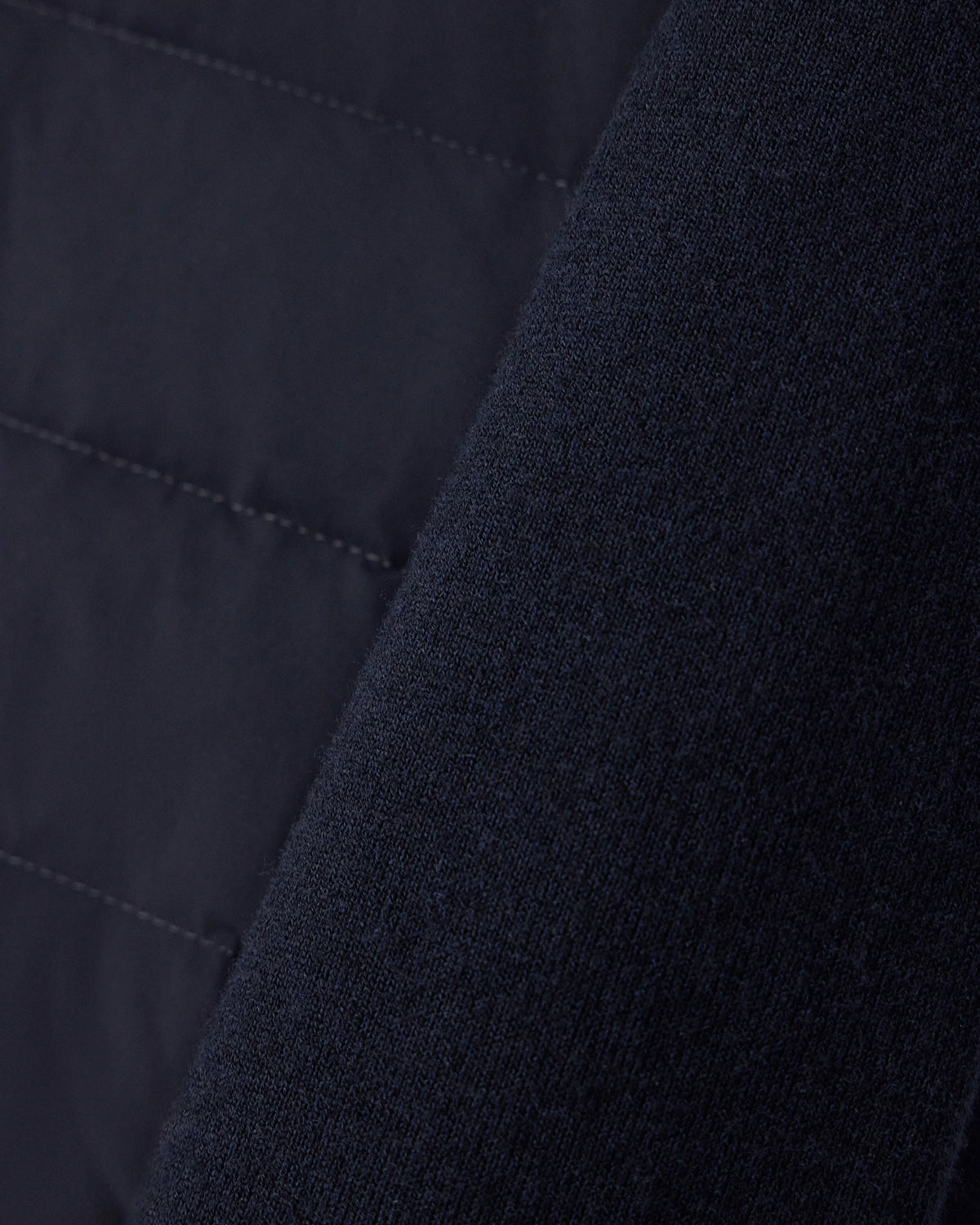 Stretch nylon down jacket with knit sleeves Travel Essential