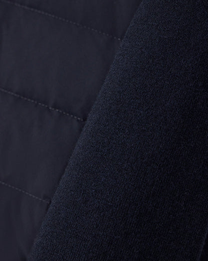 Stretch nylon down jacket with knit sleeves Travel Essential
