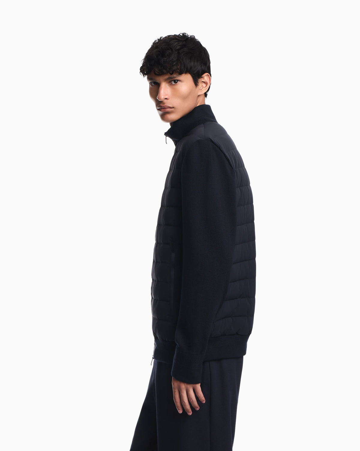Stretch nylon down jacket with knit sleeves Travel Essential