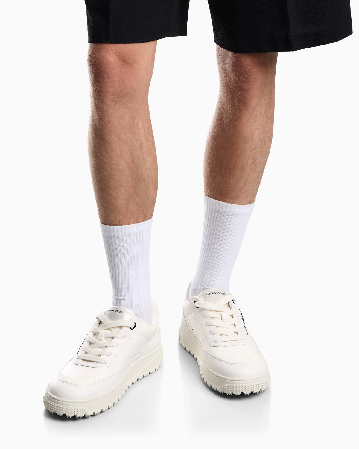 Smooth leather lace-up sneakers with a textured rubber sole