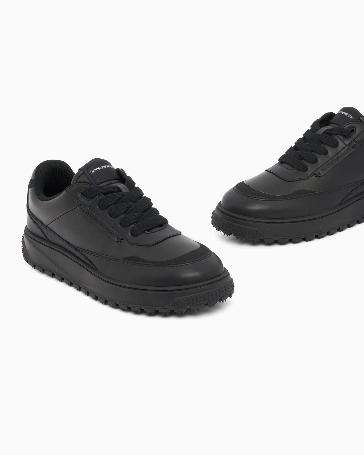Smooth leather lace-up sneakers with a textured rubber sole