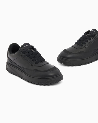 Smooth leather lace-up sneakers with a textured rubber sole