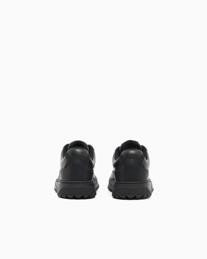Smooth leather lace-up sneakers with a textured rubber sole