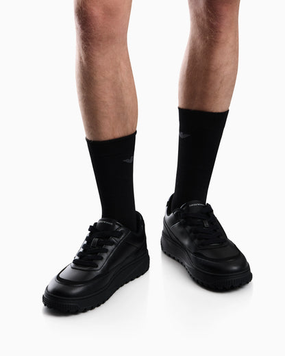 Smooth leather lace-up sneakers with a textured rubber sole