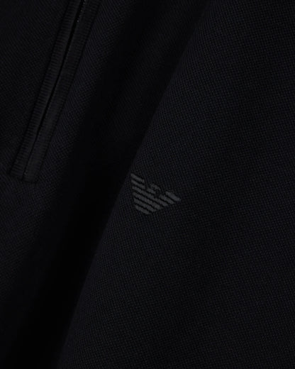 Polo shirt in piqué with partial zip