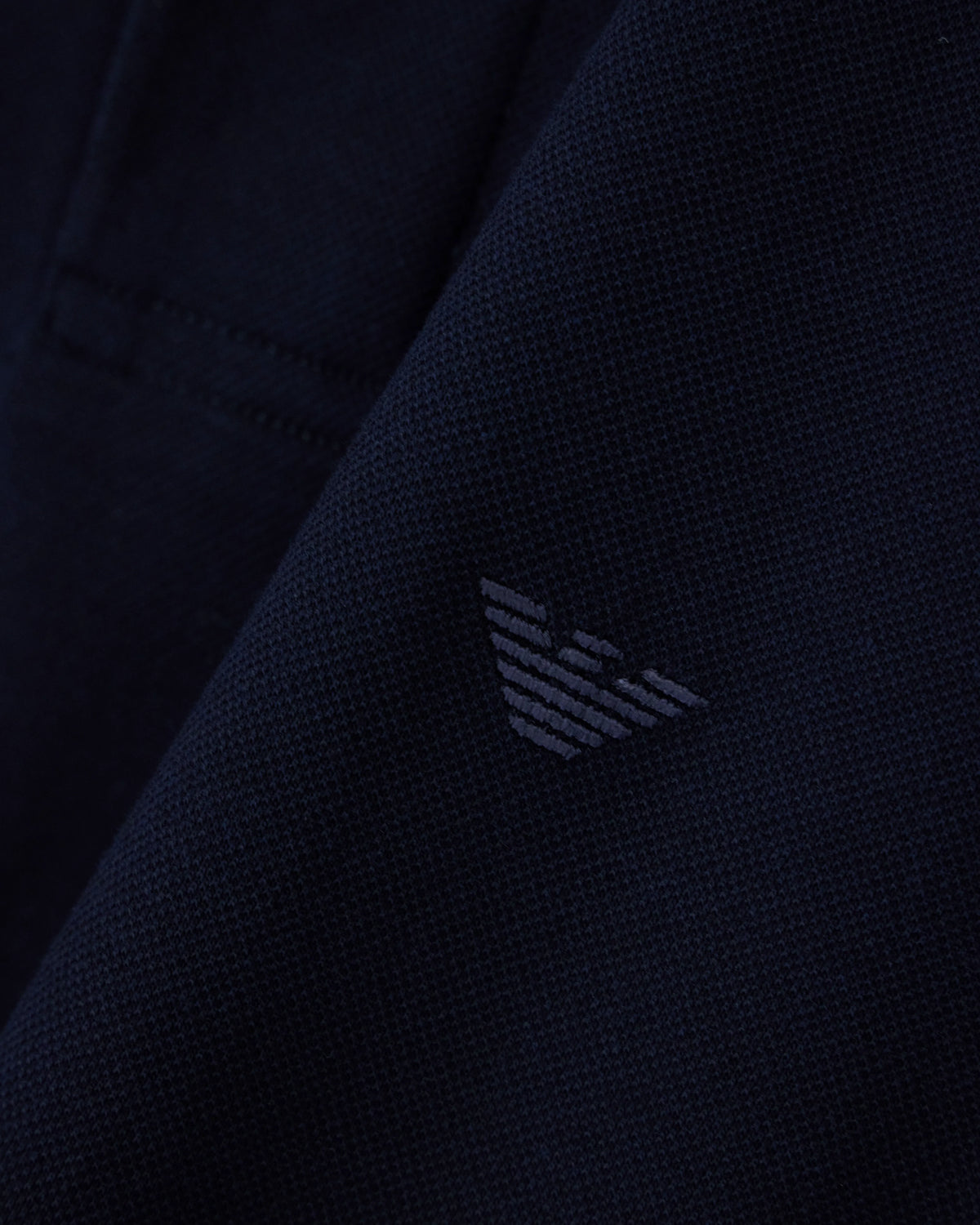 Piqué polo shirt with stripe detail on the collar