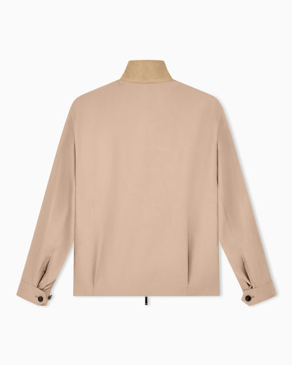 Blouson jacket with high collar and angled flap pockets