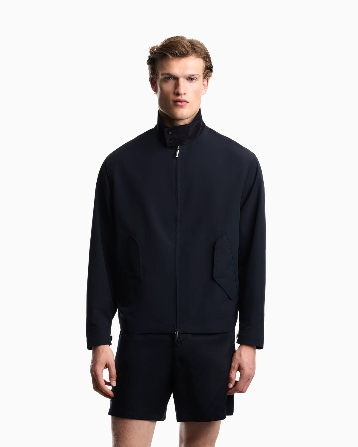 Blouson jacket with high collar and angled flap pockets