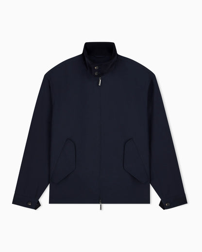 Blouson jacket with high collar and angled flap pockets