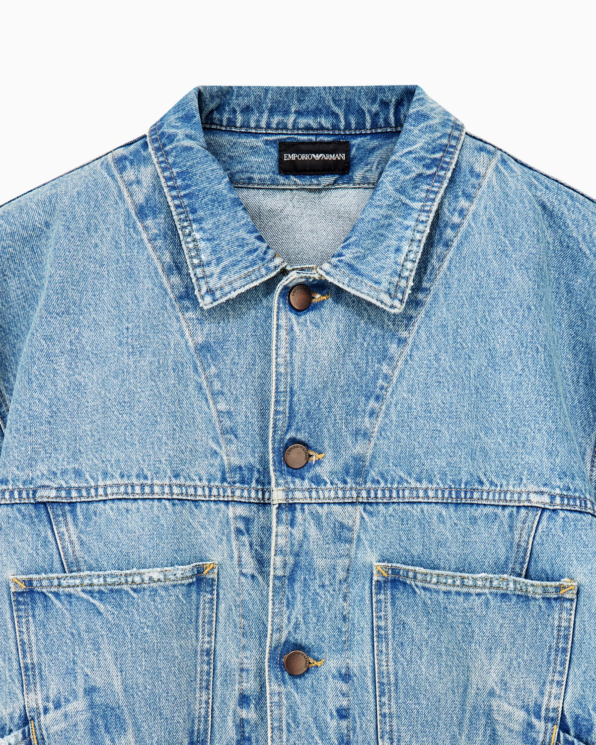 Blouson jacket in stone washed denim with metal buttons