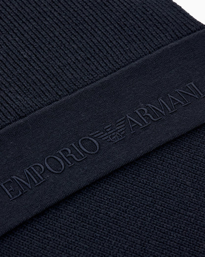 Ribbed virgin wool scarf with an embossed logo