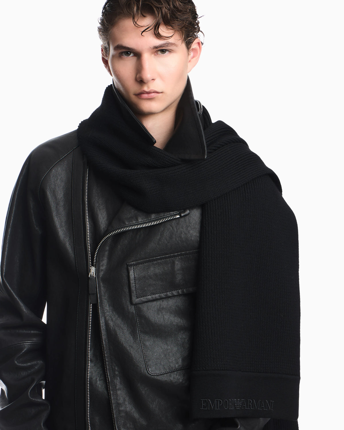 Ribbed virgin wool scarf with an embossed logo