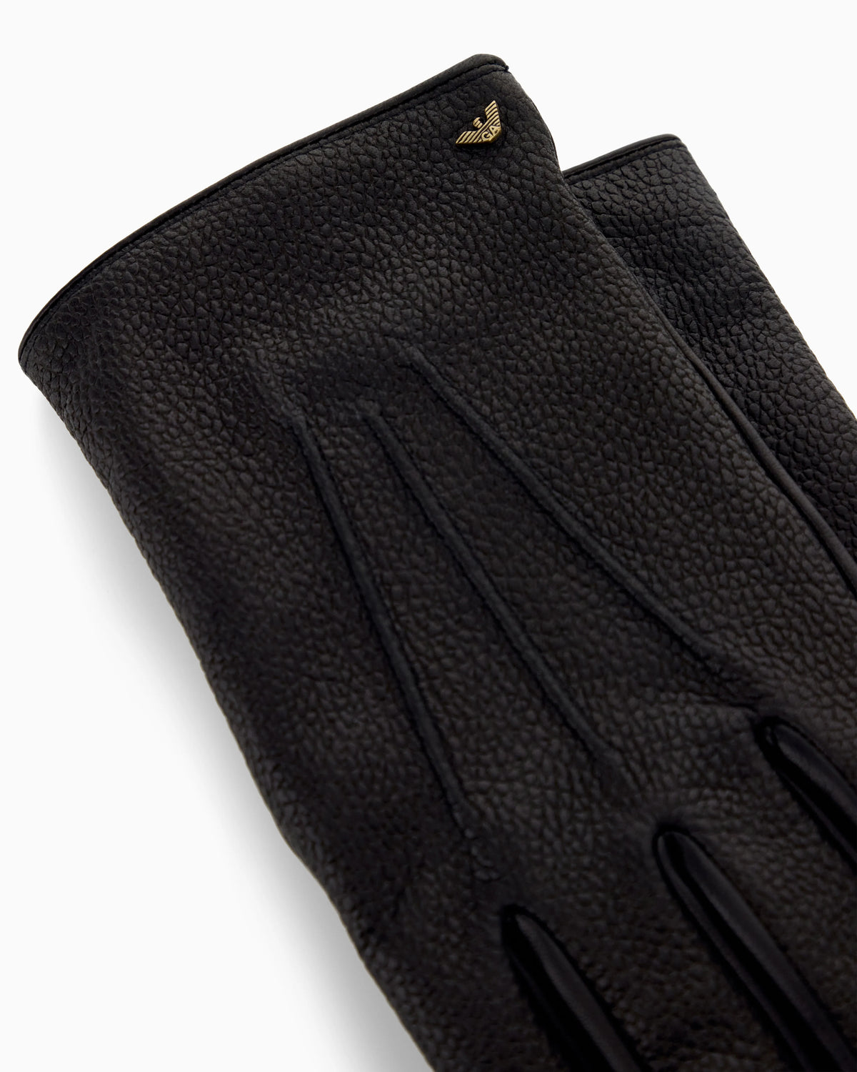 Leather gloves with wool lining and a metal eagle logo