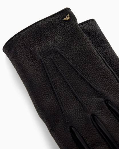 Leather gloves with wool lining and a metal eagle logo