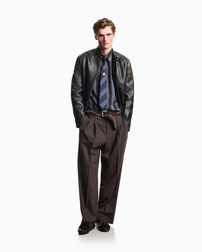 Shiny leather blouson with quilted shoulders and a zip