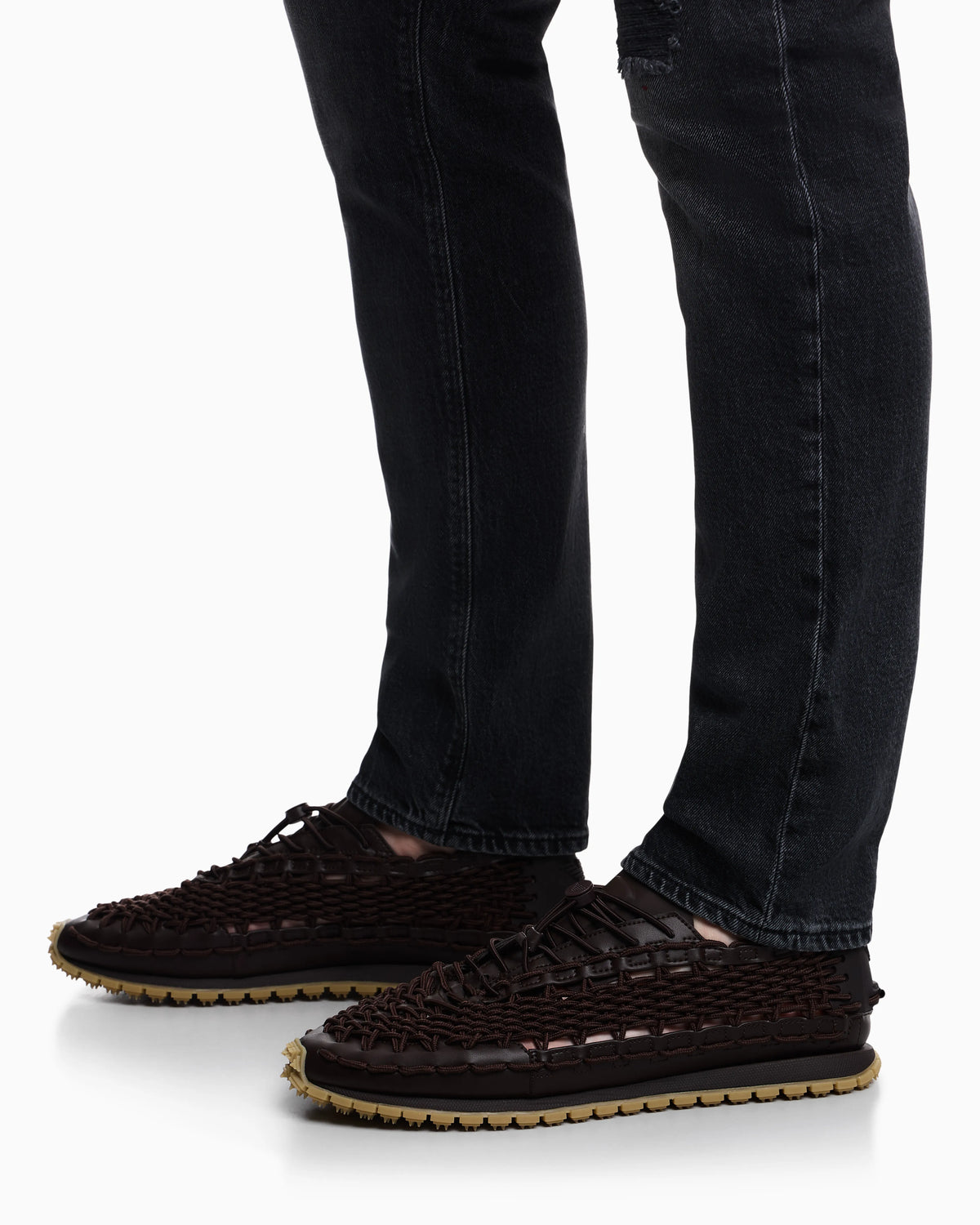 Sneakers with woven design and rugged rubber sole