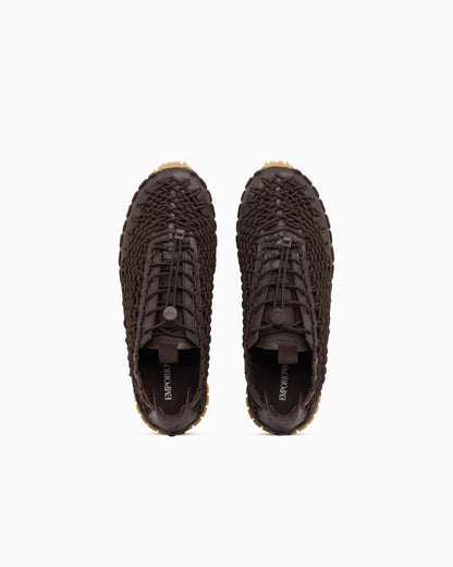 Sneakers with woven design and rugged rubber sole