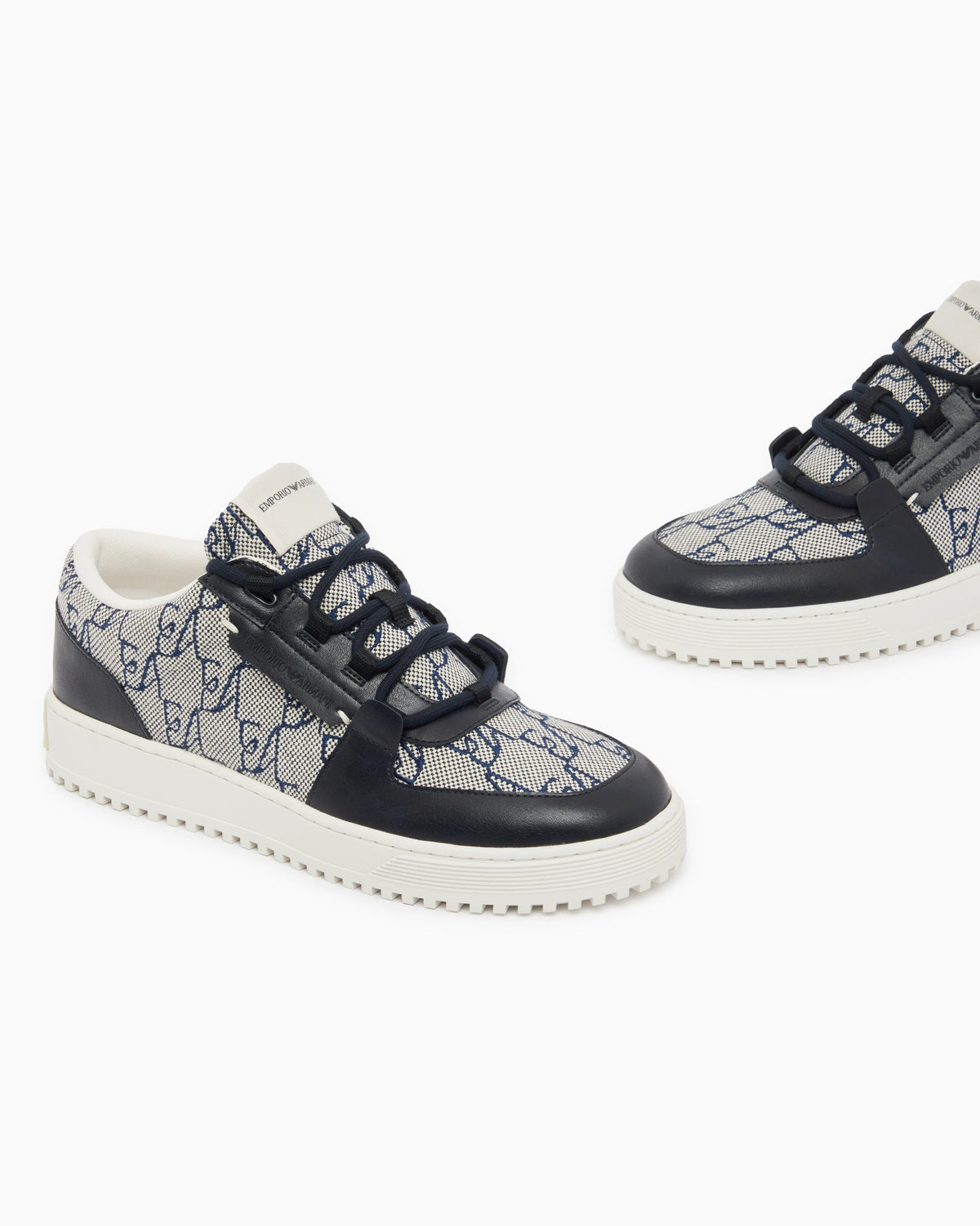 Sneakers in canvas and leather with an all-over logo pattern