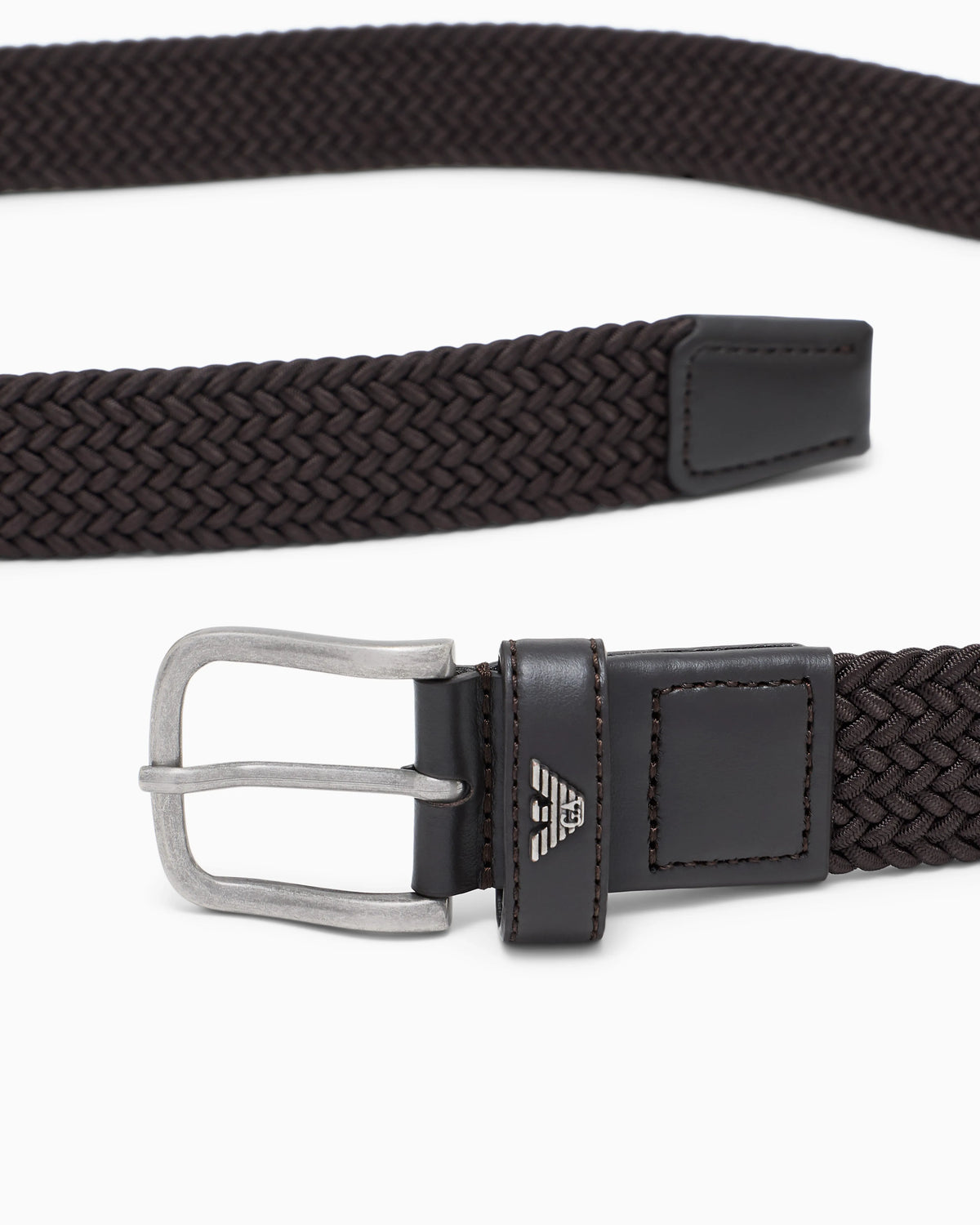 Braided tongue belt with a metal buckle and leather details