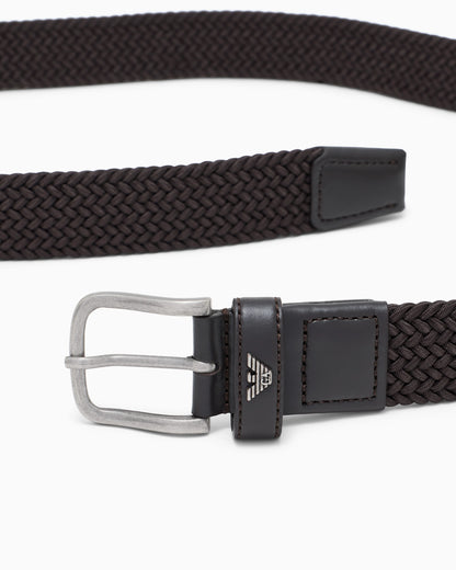 Braided tongue belt with a metal buckle and leather details