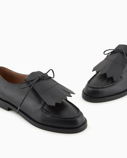 Leather lace-ups with fringes