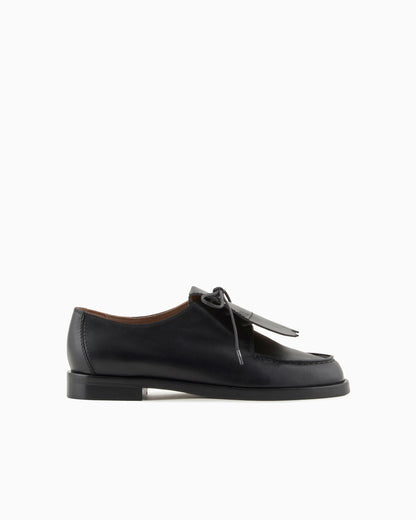 Leather lace-ups with fringes