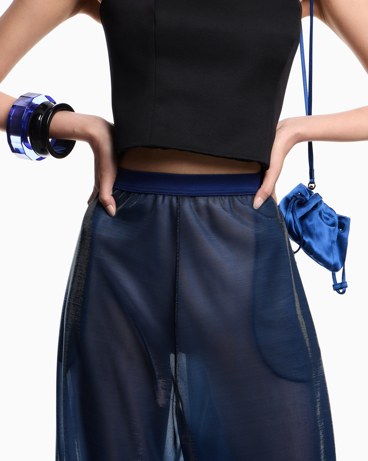 Wide trousers in iridescent knit mesh