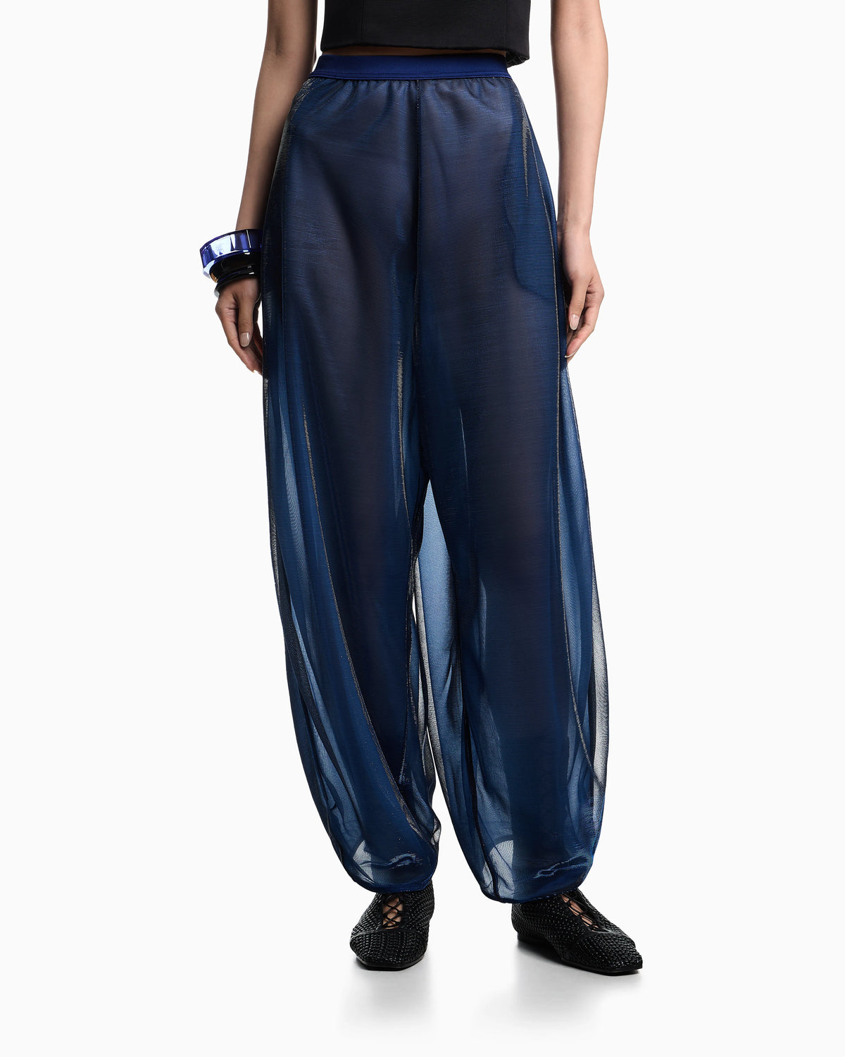 Wide trousers in iridescent knit mesh