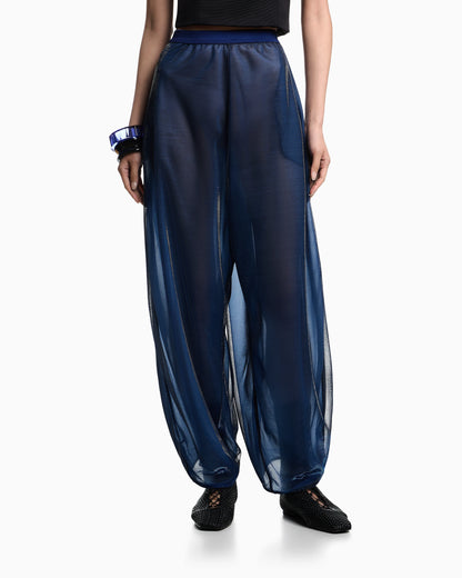 Wide trousers in iridescent knit mesh