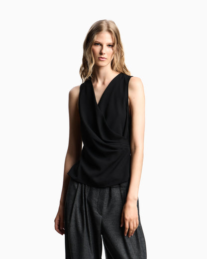 Fluid crêpe top with draping