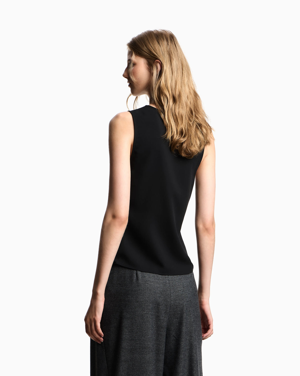 Fluid crêpe top with draping