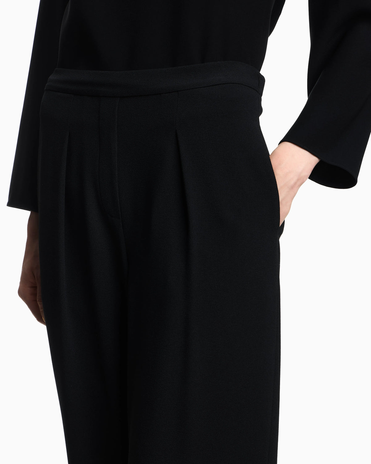 Stretch sandblasted fabric trousers with pleats
