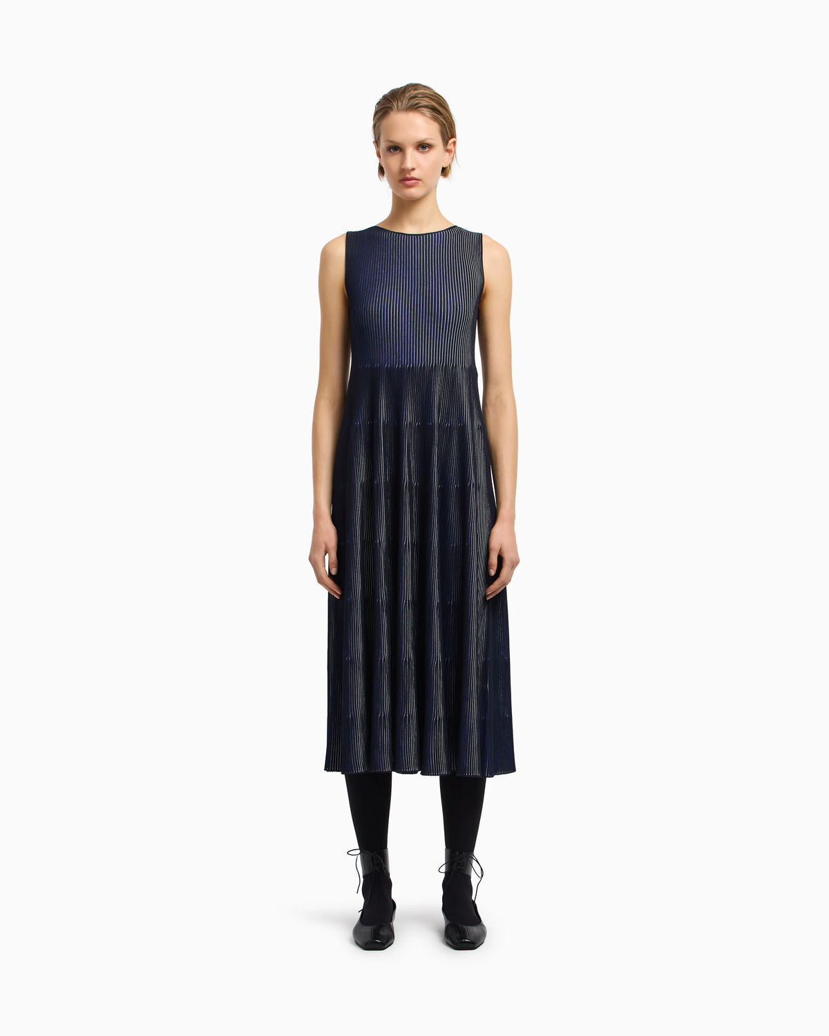 Sleeveless dress in knit front and back plated effect