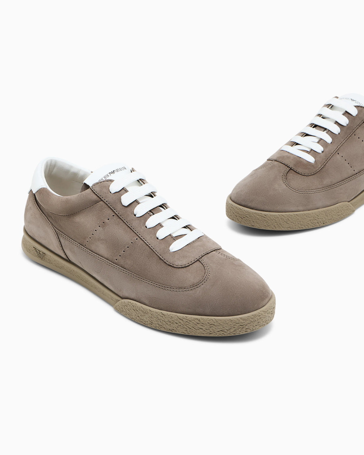 Nubuck sneakers with perforated details and a rubber sole
