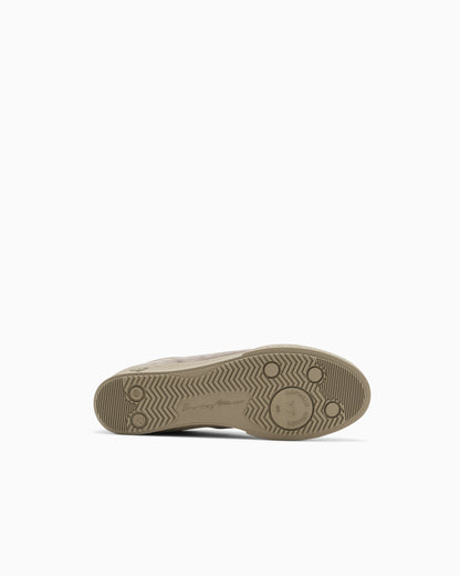 Nubuck sneakers with perforated details and a rubber sole