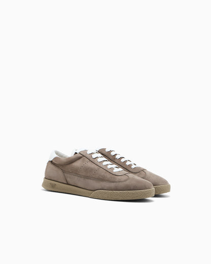 Nubuck sneakers with perforated details and a rubber sole