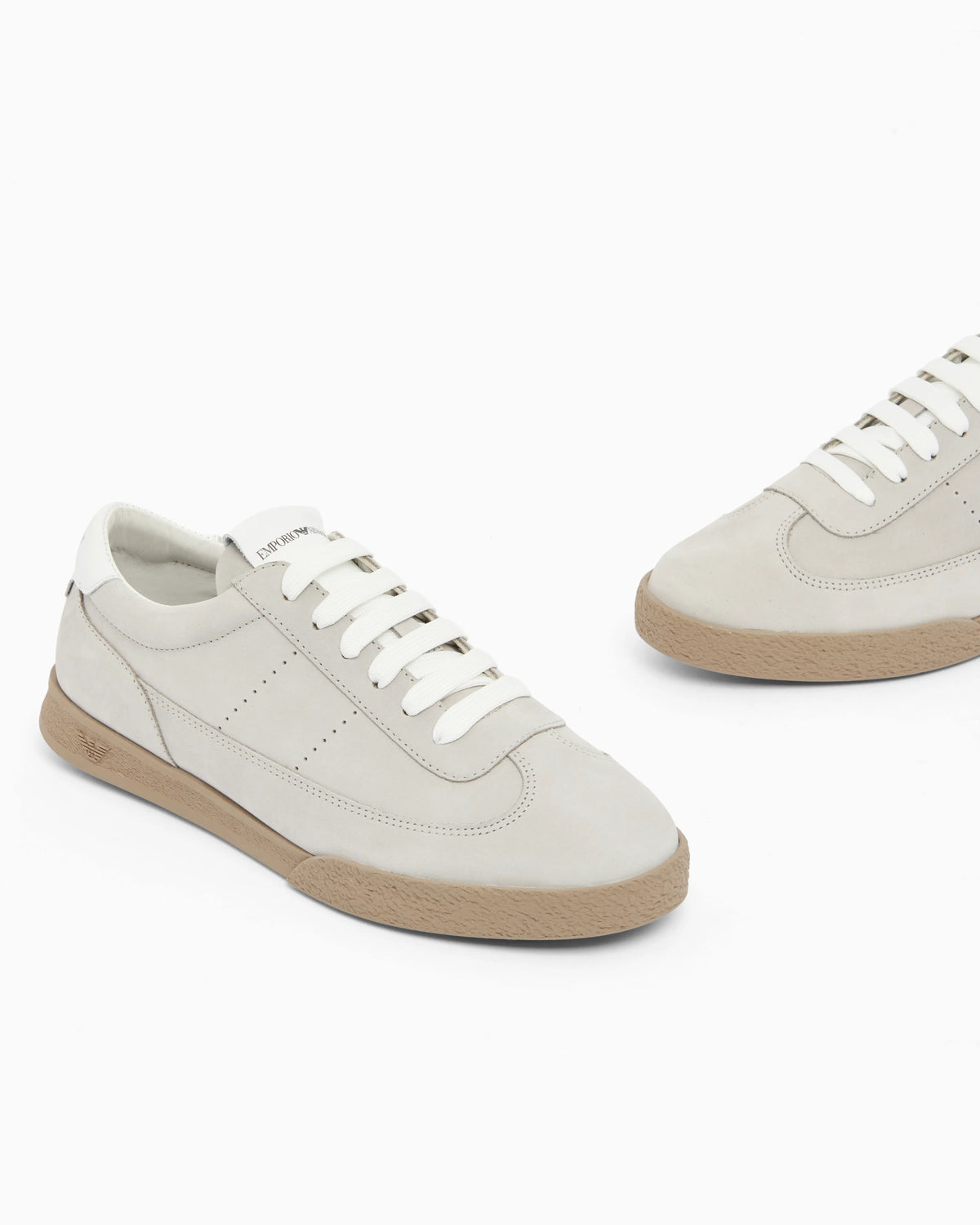Nubuck sneakers with perforated details and a rubber sole