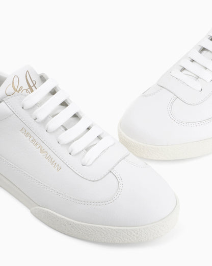 Leather sneakers with an embossed logo and a rubber sole