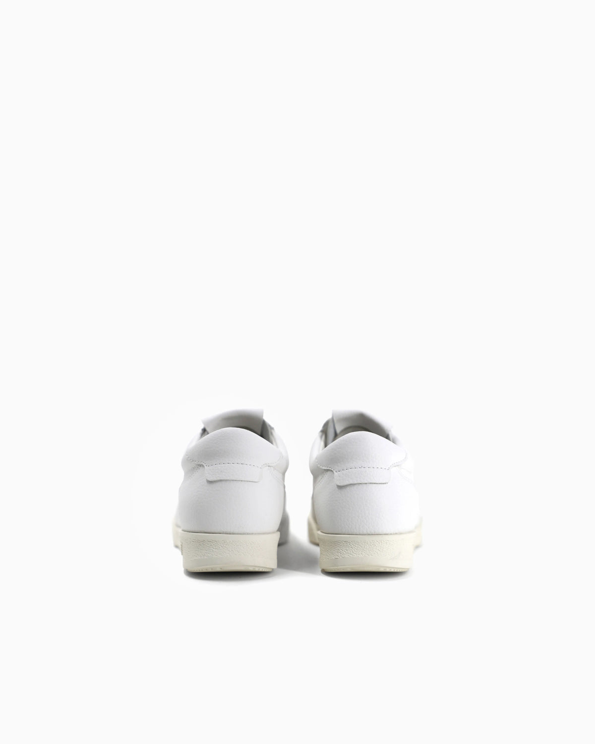 Leather sneakers with an embossed logo and a rubber sole