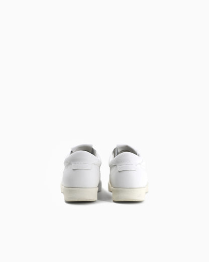 Leather sneakers with an embossed logo and a rubber sole